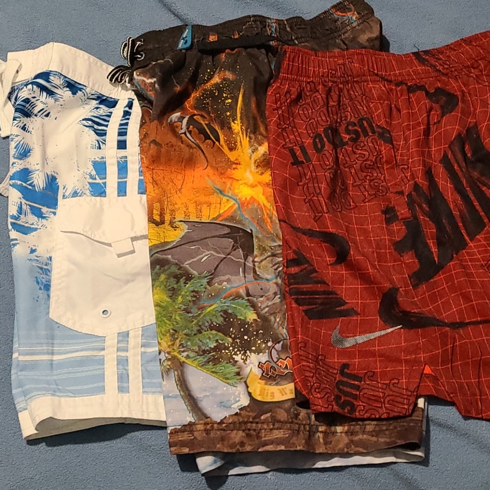 Bundle of boys size M swim suits